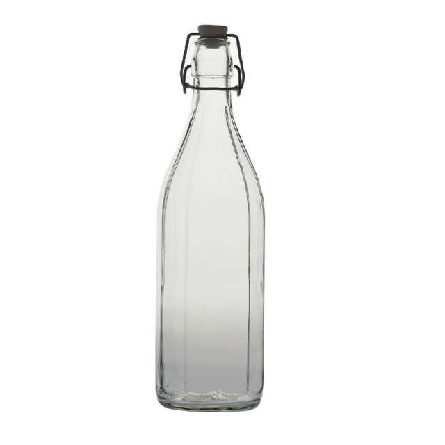 cadre vide blanc et petite bouteille en verre avec huile